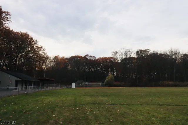 a view of a street with trees