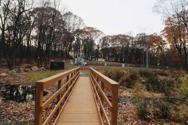 a view of a lake with trees