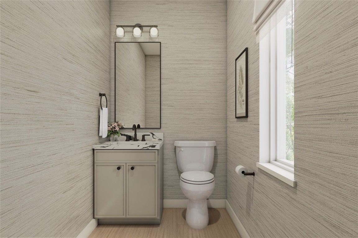 1200 Bianca Breeze Place Austin, TX 78721 - Photo 24 of 32 a bathroom with a toilet a sink and mirror