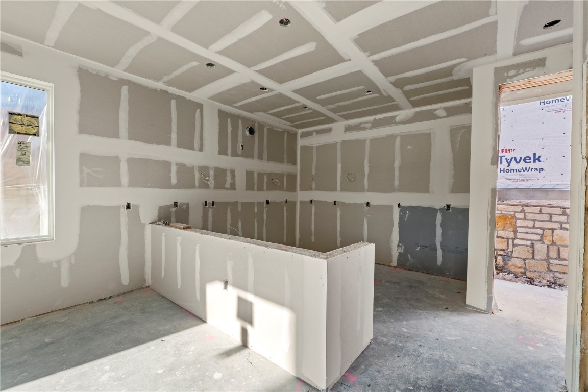 1200 Bianca Breeze Place Austin, TX 78721 - Photo 6 of 32 a view of an empty room with wooden walls