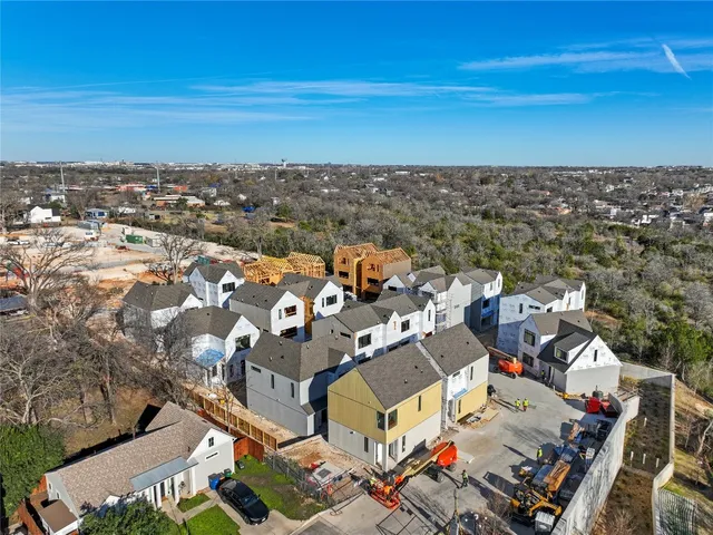 an aerial view of a building with outdoor space