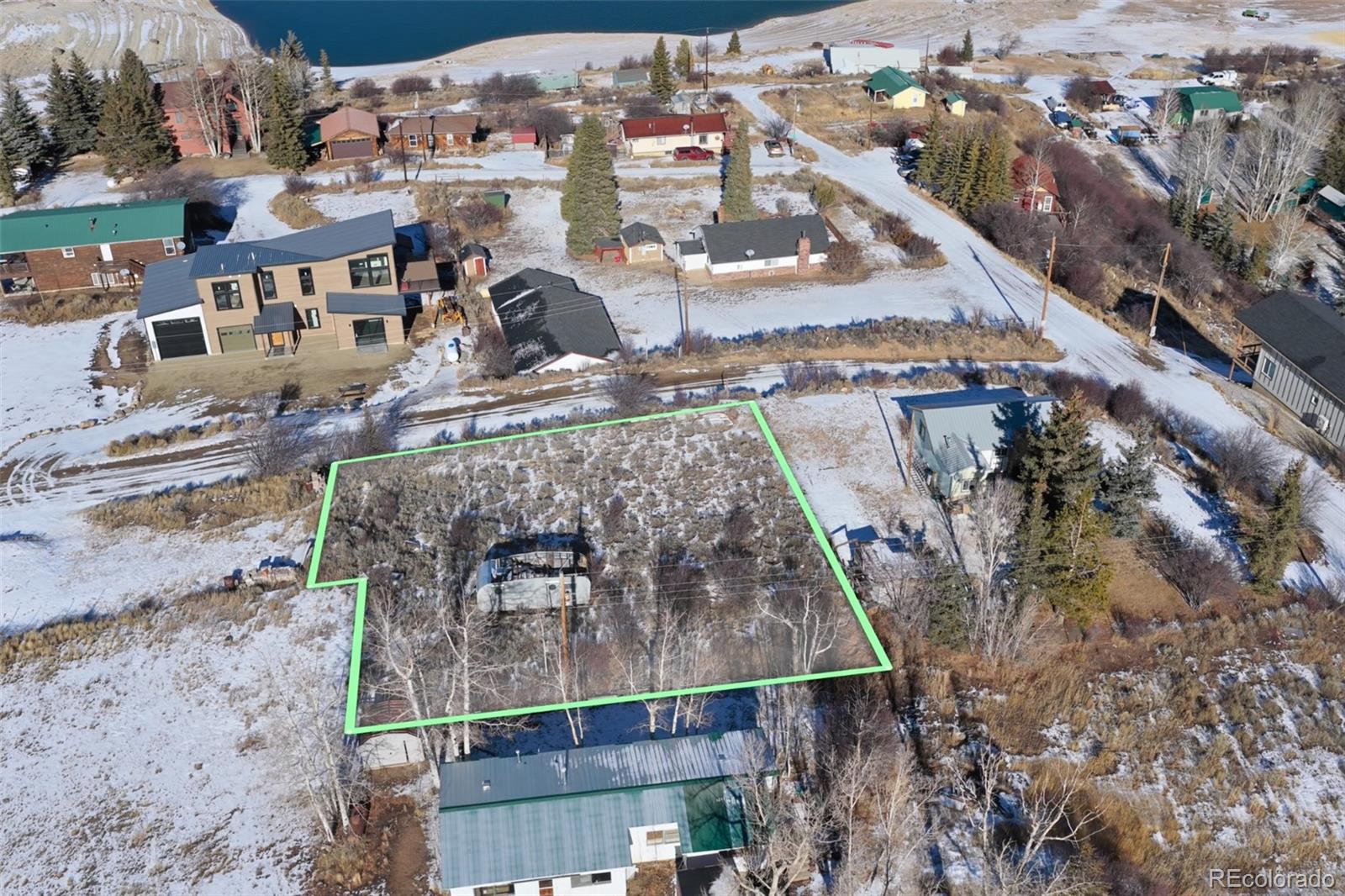 6895 Heeney Road Heeney, CO 80498 - Photo 4 of 7 an aerial view of residential houses with outdoor space