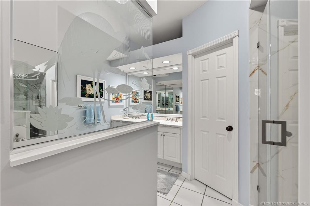 12392 Harbour Ridge Boulevard, Unit 54 Palm City, FL 34990 - Photo 17 of 35 a kitchen with stainless steel appliances a sink and cabinets