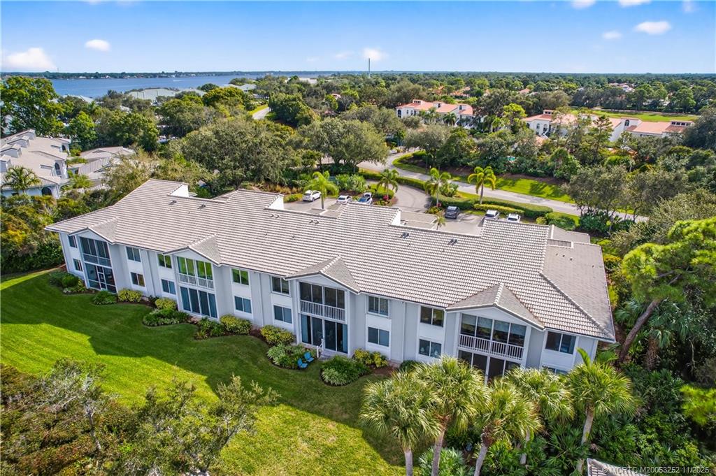 12392 Harbour Ridge Boulevard, Unit 54 Palm City, FL 34990 - Photo 26 of 35 a aerial view of a house with a garden