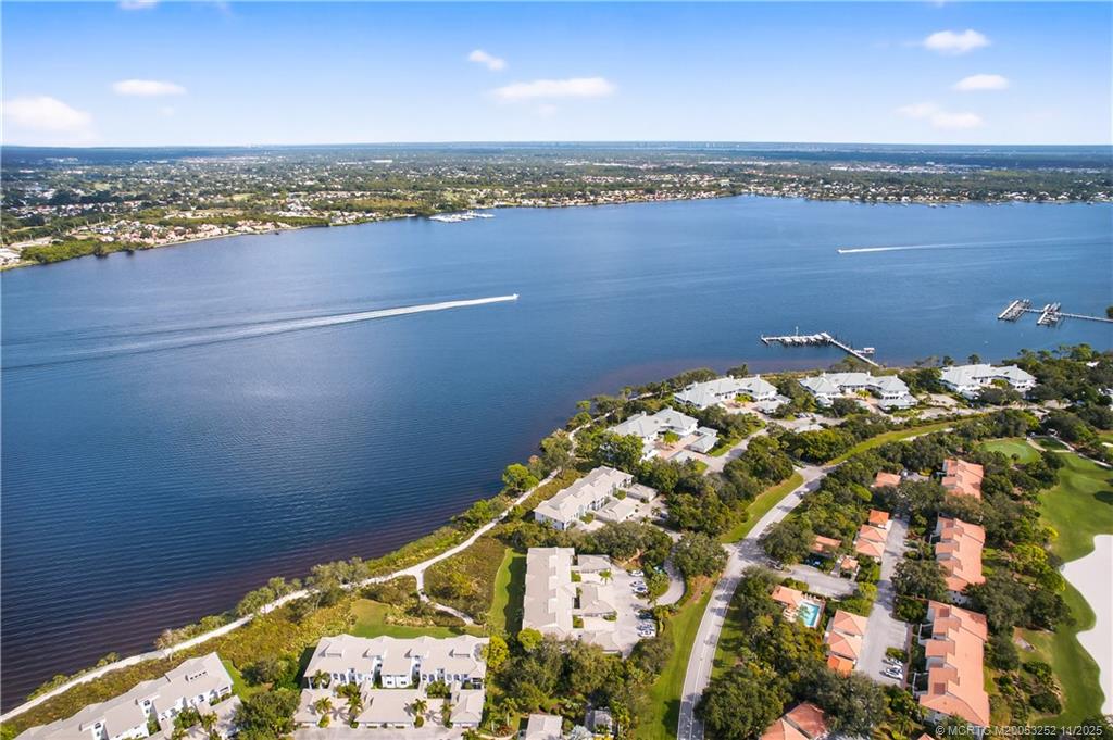 12392 Harbour Ridge Boulevard, Unit 54 Palm City, FL 34990 - Photo 30 of 35 a view of a lake