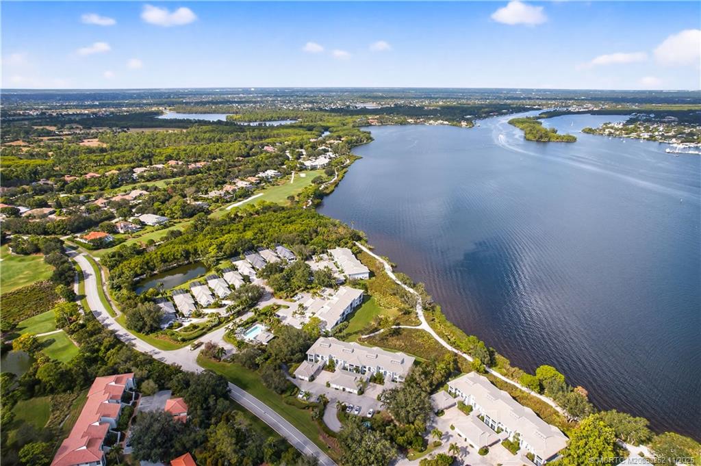12392 Harbour Ridge Boulevard, Unit 54 Palm City, FL 34990 - Photo 31 of 35 a view of an ocean and beach