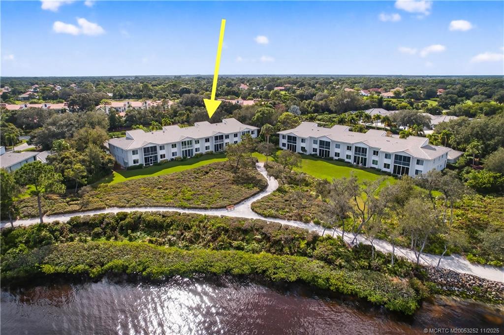 12392 Harbour Ridge Boulevard, Unit 54 Palm City, FL 34990 - Photo 33 of 35 a view of a city with a lake view