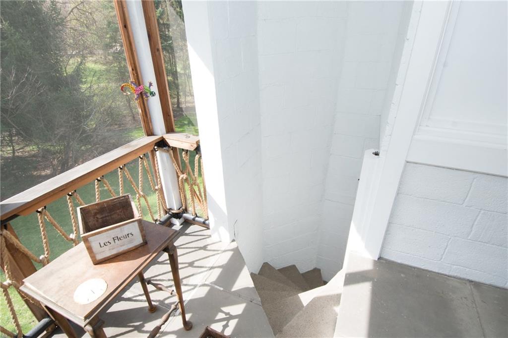 4917 Baptist Road Whitehall, PA 15227 - Photo 20 of 25 A view of the stairway leading to the patio below. It has similarities to a lighthouse staircase!