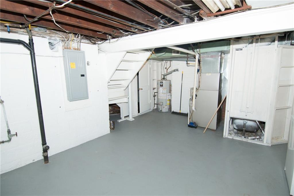 4917 Baptist Road Whitehall, PA 15227 - Photo 22 of 25 A view of the huge basement with an updated electric panel and newer furnace and hot water heater.