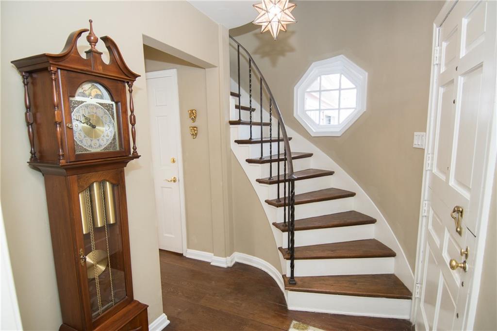 4917 Baptist Road Whitehall, PA 15227 - Photo 9 of 25 Another view of the gorgeous entry with the curved staircase leading to the upstairs bedrooms and full bath.