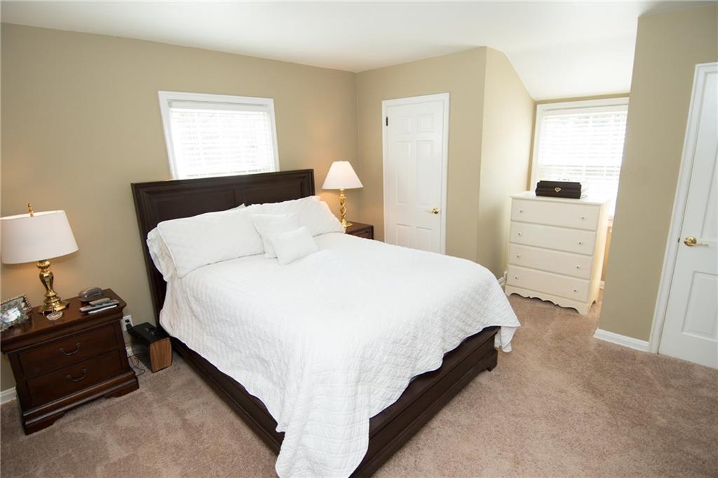 4917 Baptist Road Whitehall, PA 15227 - Photo 10 of 25 The master bedroom is a generous size with 2 closets and dormer style windows giving the room charm and character. It has been painted in a warm, neutral tone and new, neutral carpeting installed to match any decor.