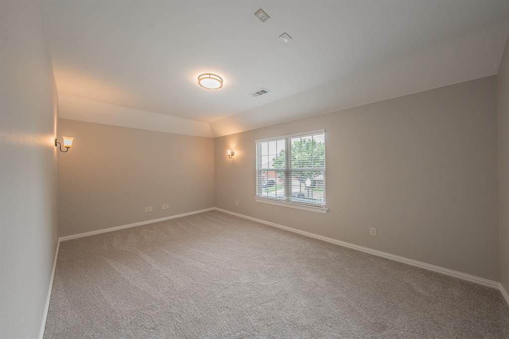 412 Hideaway Road McKinney, TX 75072 - Photo 37 of 40 an empty room with a window