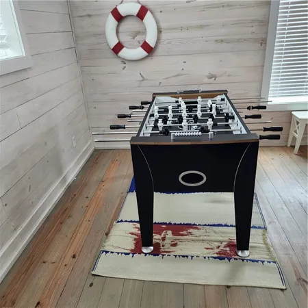 a kitchen with a wooden floor