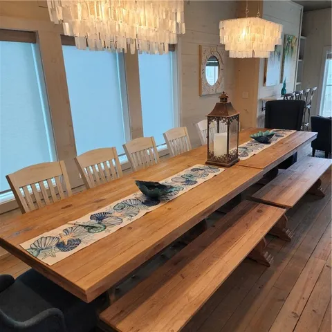 a view of a dining room with furniture