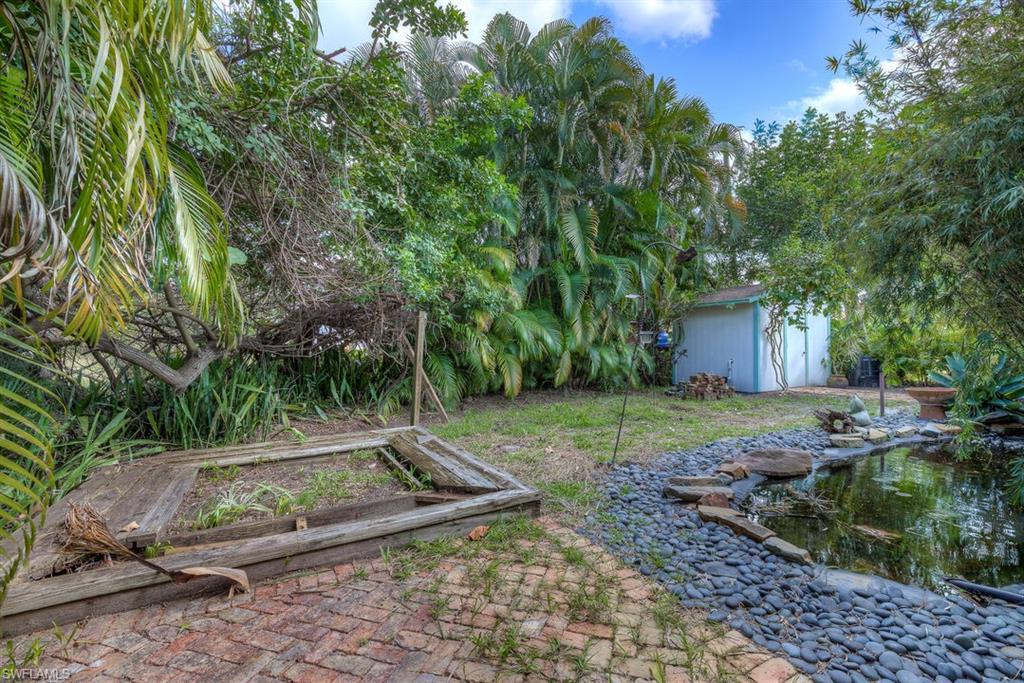 9144 7th Street North Naples, FL 34108 - Photo 13 of 20 a view of a backyard