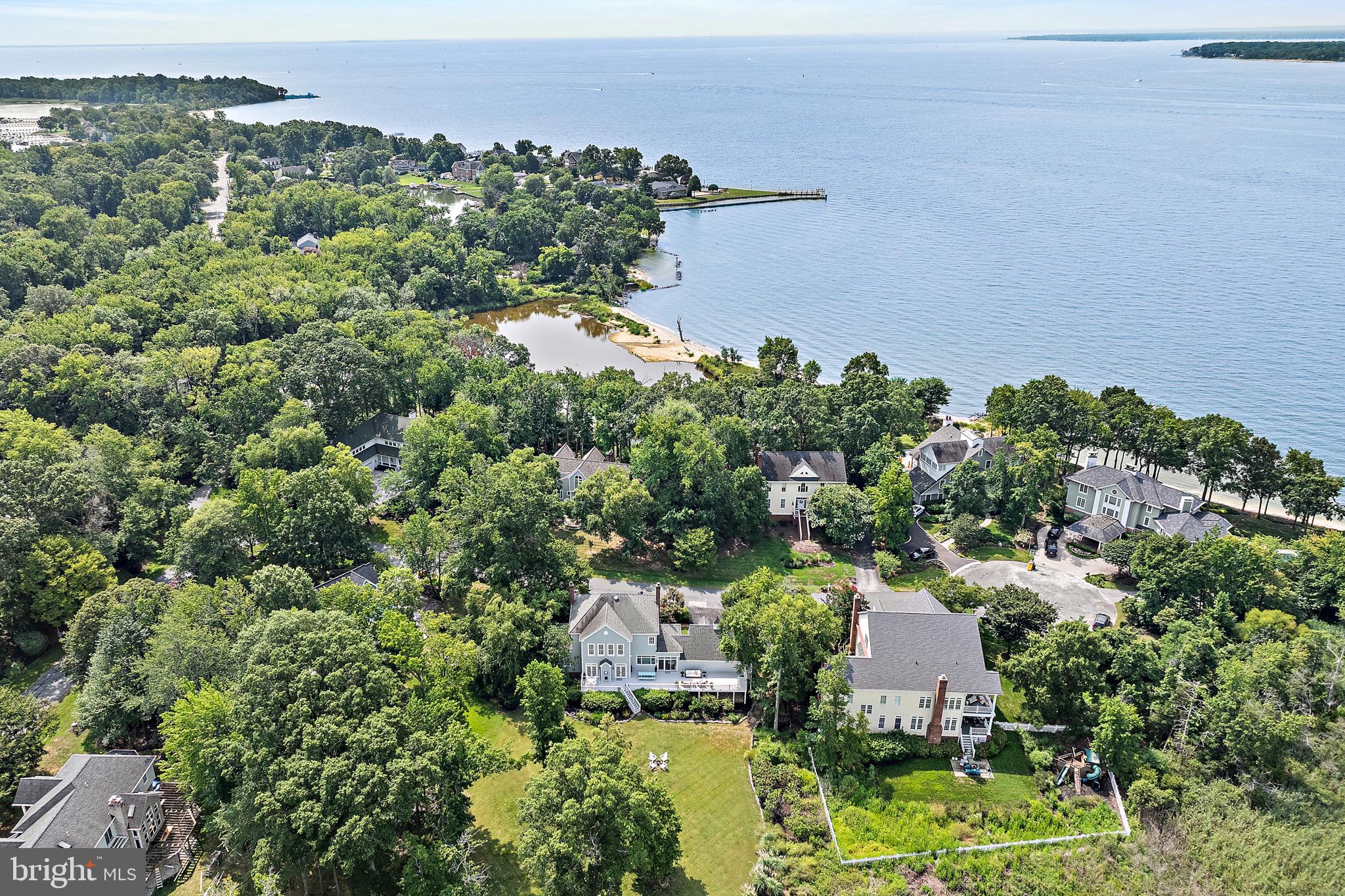 1307 Beachview Road Annapolis, MD 21403 - Photo 13 of 111 an aerial view of a house with a yard and lake view