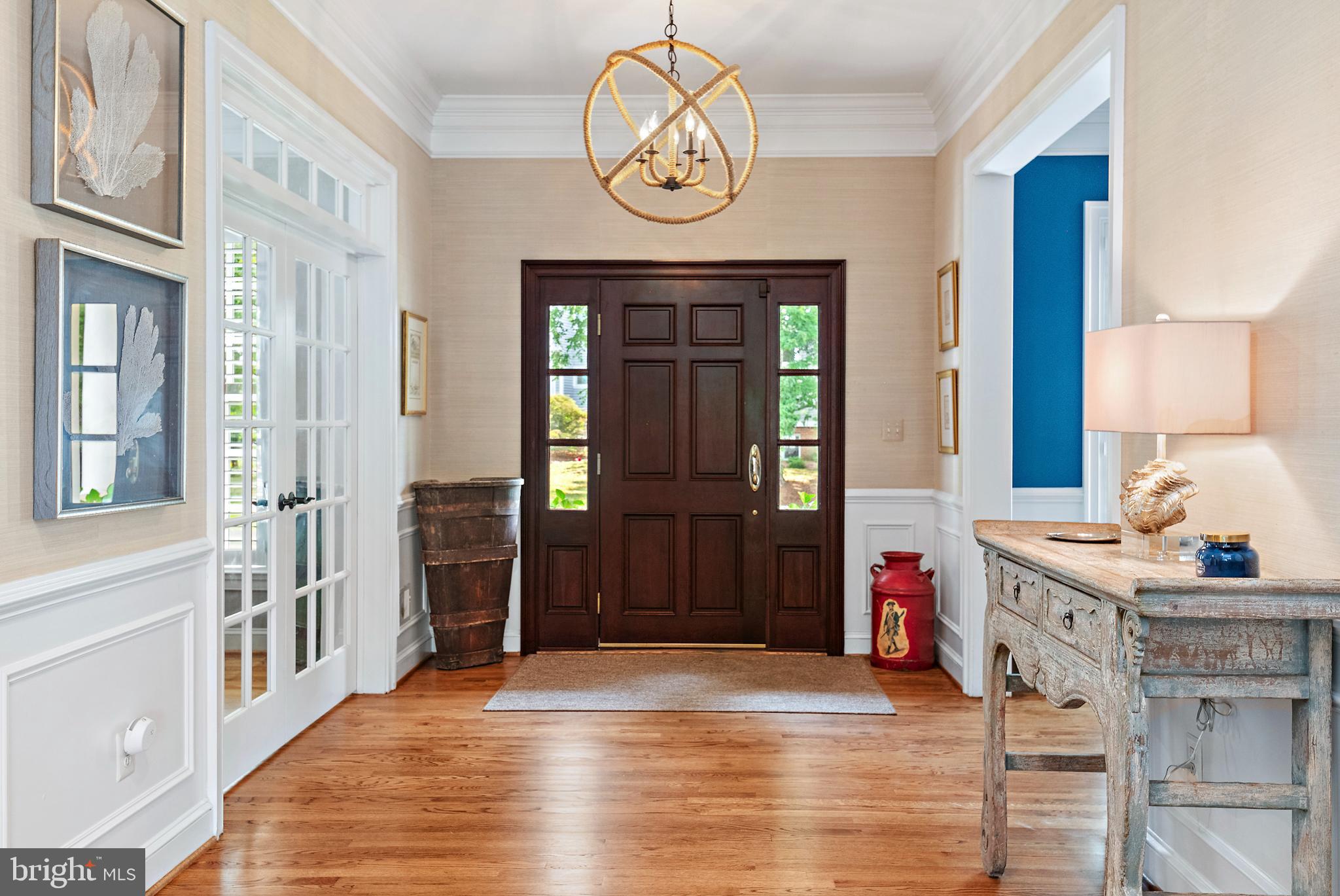 1307 Beachview Road Annapolis, MD 21403 - Photo 18 of 111 a view of a hallway with wooden floor and workspace