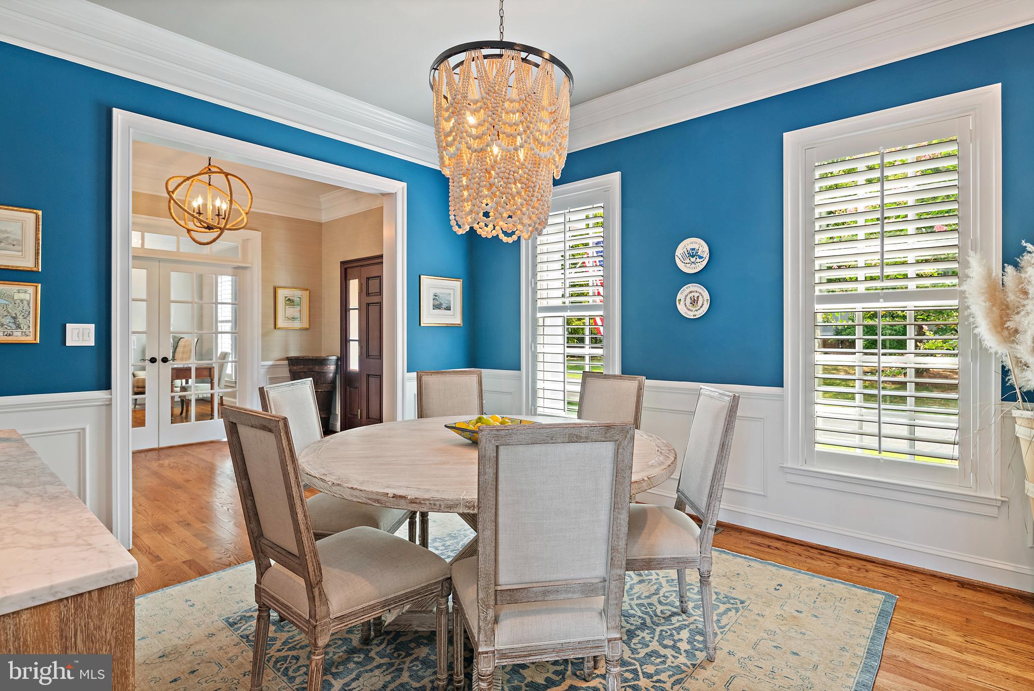 1307 Beachview Road Annapolis, MD 21403 - Photo 22 of 111 a view of a dining room with furniture and chandelier