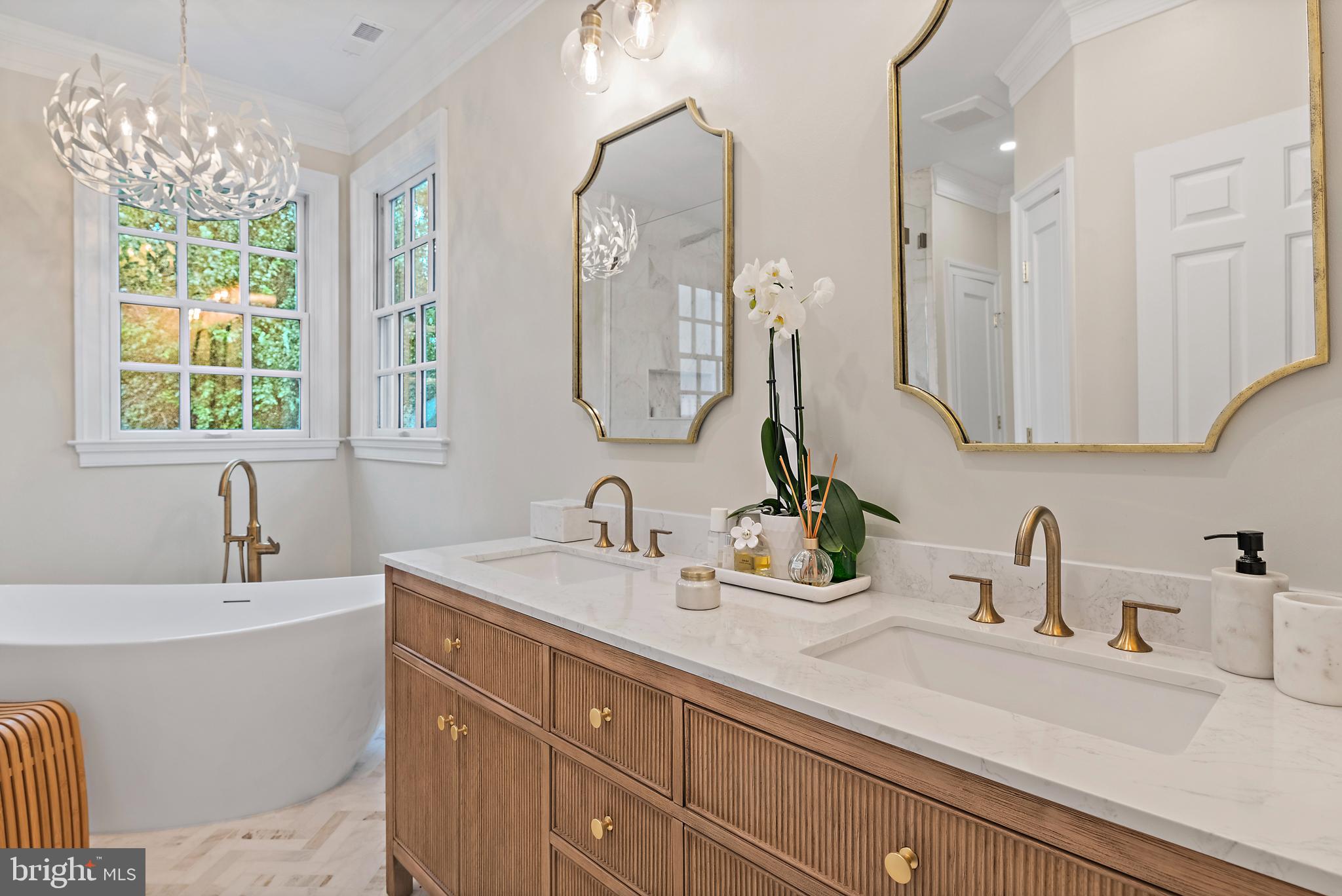 1307 Beachview Road Annapolis, MD 21403 - Photo 60 of 111 a bathroom with double vanity sink two mirror and a window