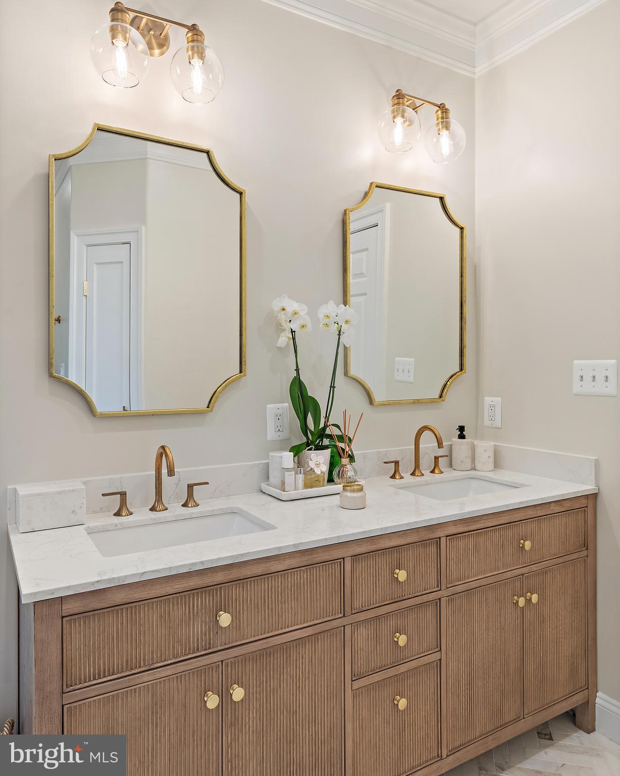 1307 Beachview Road Annapolis, MD 21403 - Photo 61 of 111 a bathroom with double vanity sinks and a mirror