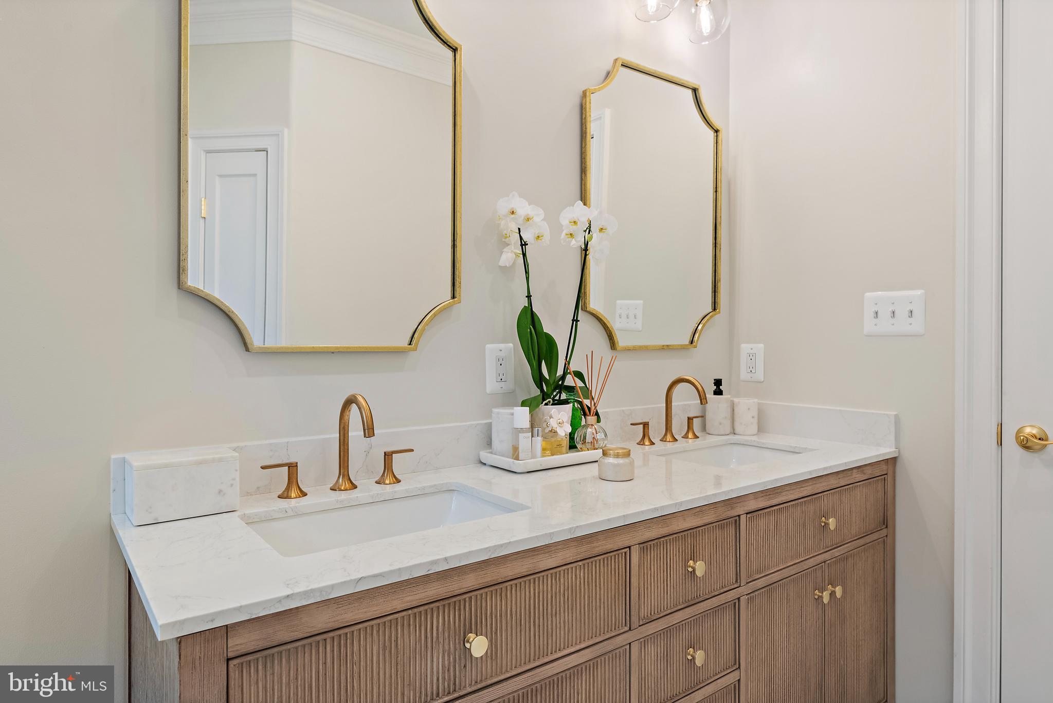 1307 Beachview Road Annapolis, MD 21403 - Photo 64 of 111 a bathroom with a sink and a mirror