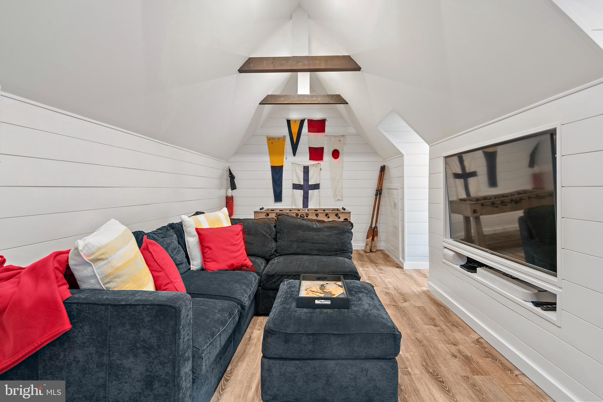1307 Beachview Road Annapolis, MD 21403 - Photo 72 of 111 a living room with furniture and a flat screen tv