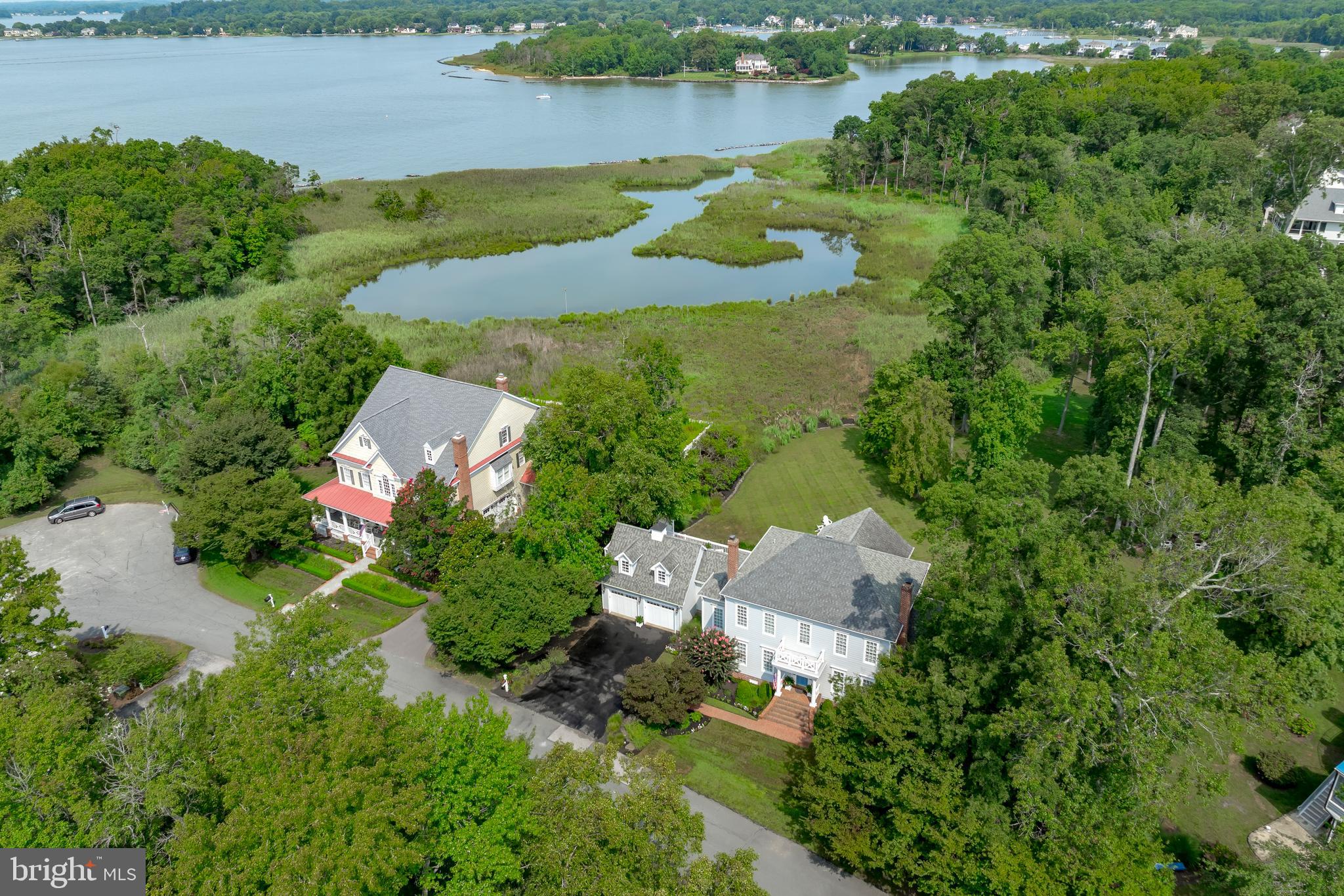 1307 Beachview Road Annapolis, MD 21403 - Photo 88 of 111 an aerial view of a house with a yard and lake view