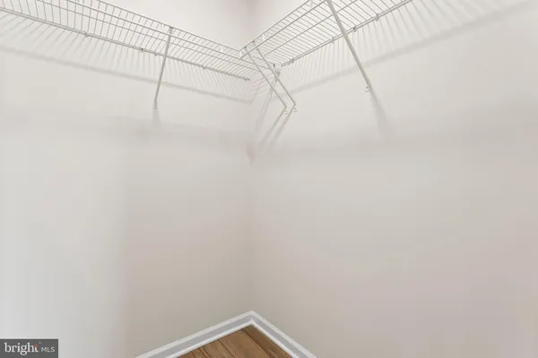 a view of a room with racks on the wall