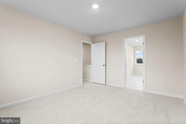 an empty room with an entryway