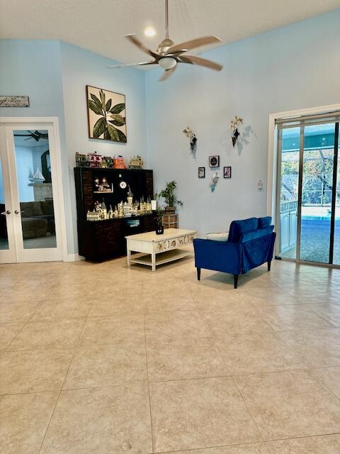 11666 Southwest Meadowlark Circle Stuart, FL 34997 - Photo 13 of 40 a living room with furniture