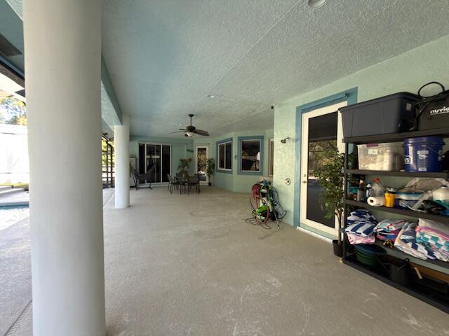 11666 Southwest Meadowlark Circle Stuart, FL 34997 - Photo 36 of 40 a view of a livingroom with storage and utility