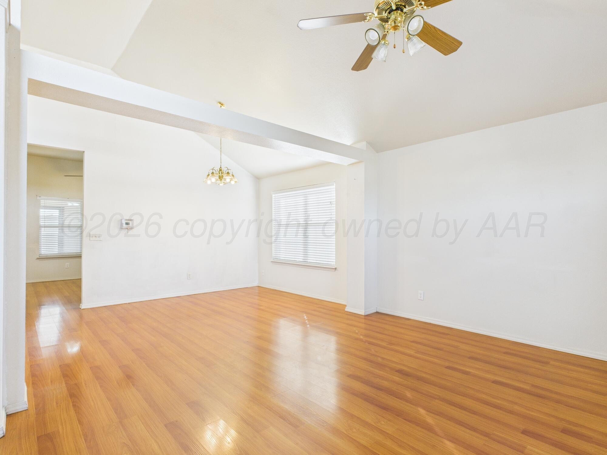 1111 Pikes Peak Drive Amarillo, TX 79110 - Photo 14 of 25 a view of empty room with wooden floor