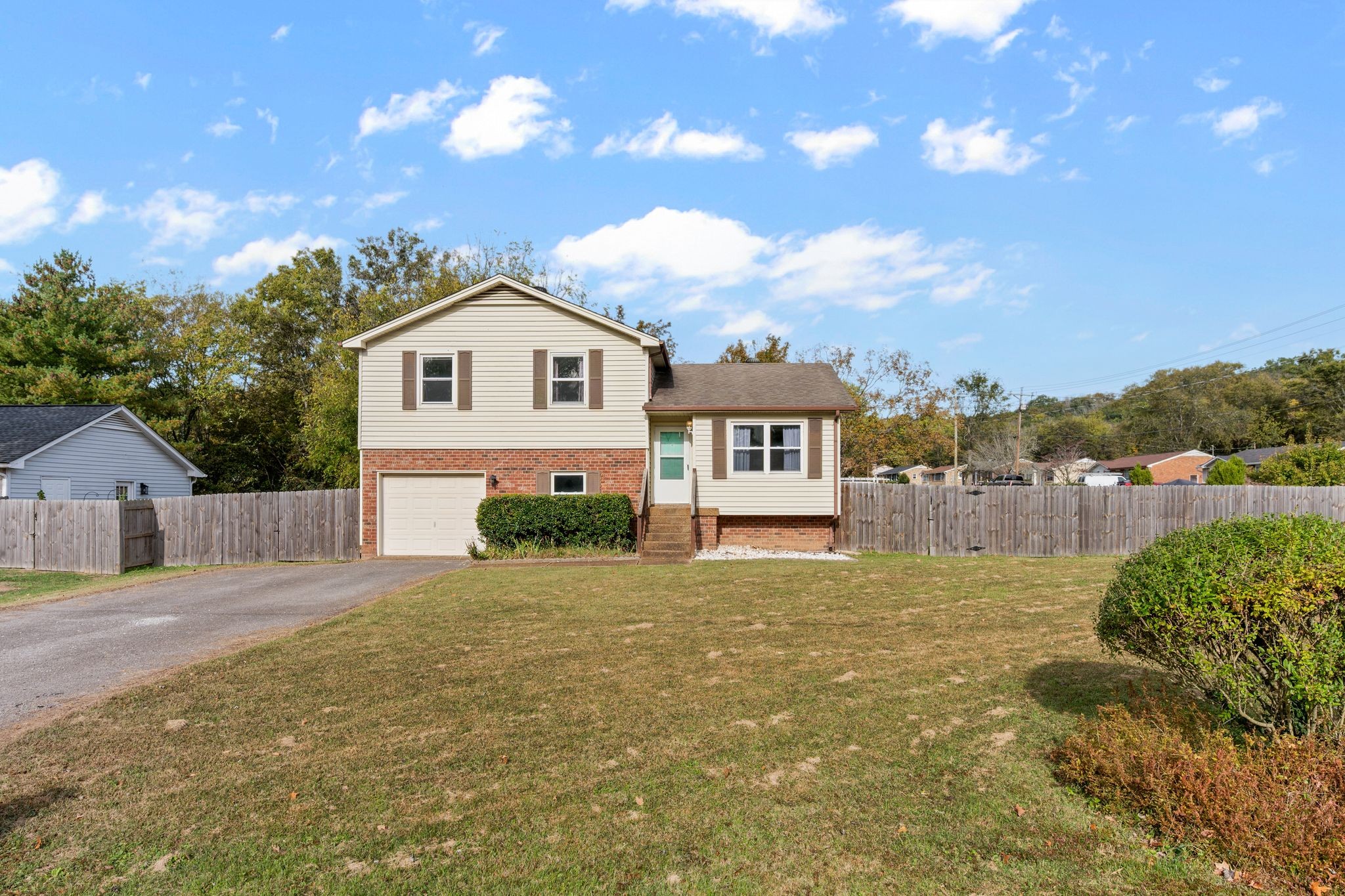 a house view with a garden space