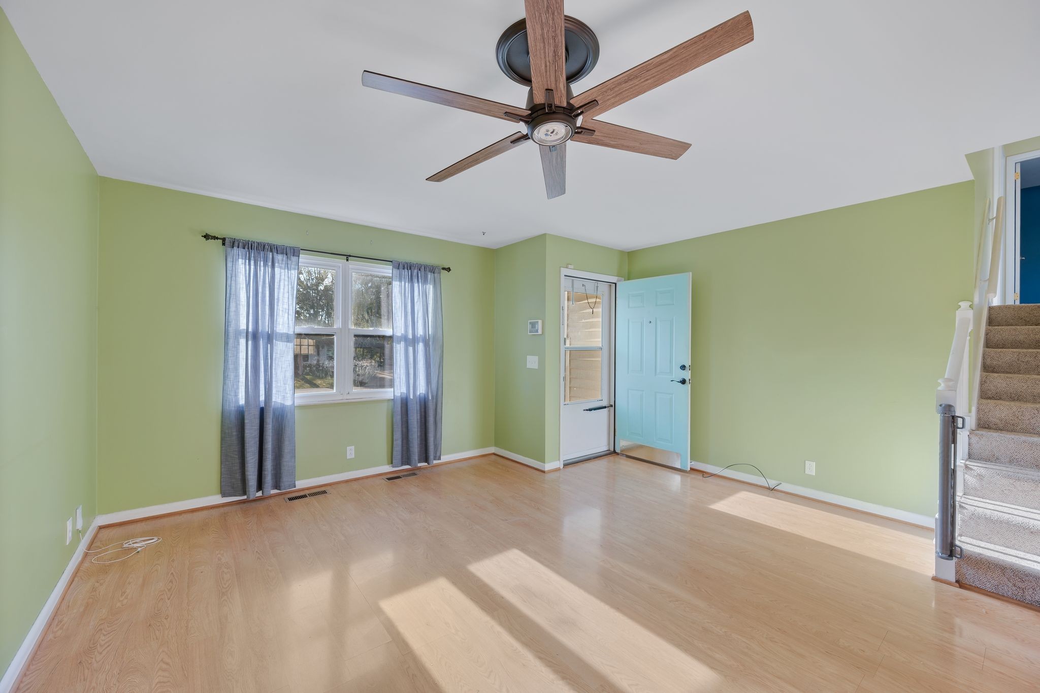 135 Grenadier Drive Franklin, TN 37064 - Photo 7 of 27 a view of an empty room with a window