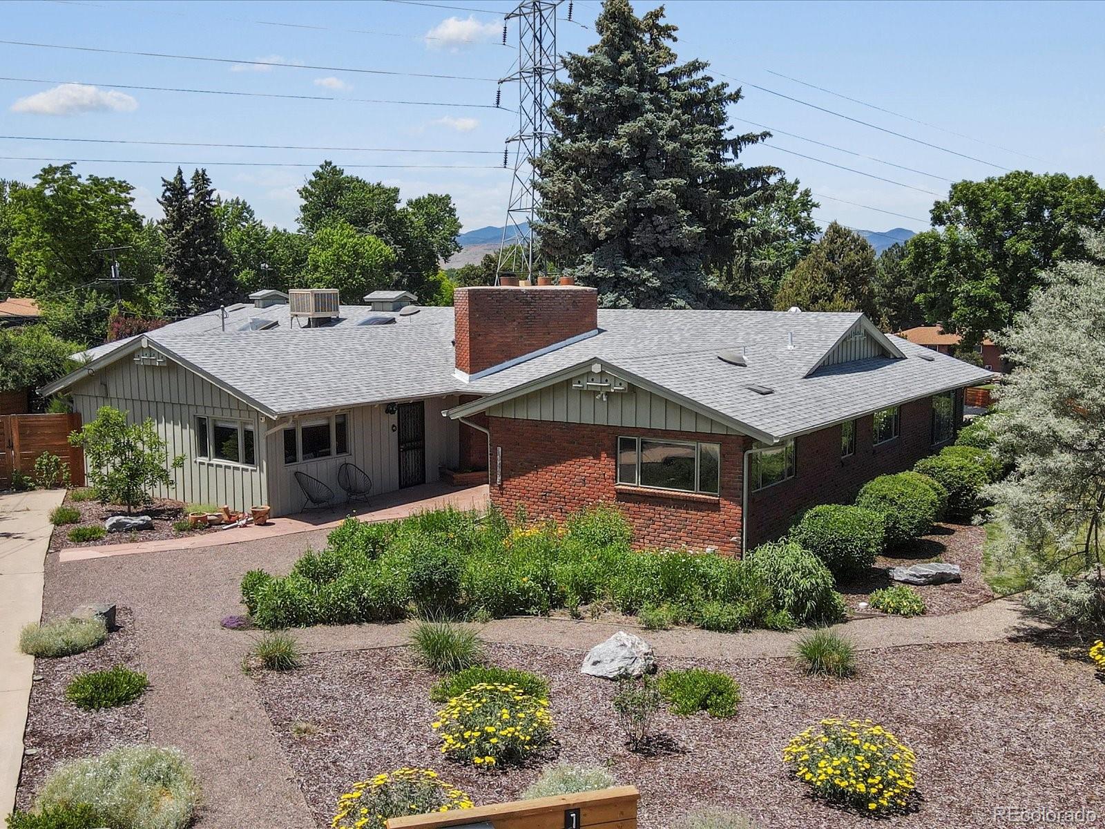 10400 West 35th Place Wheat Ridge, CO 80033 - Photo 42 of 44 an aerial view of a house with a yard