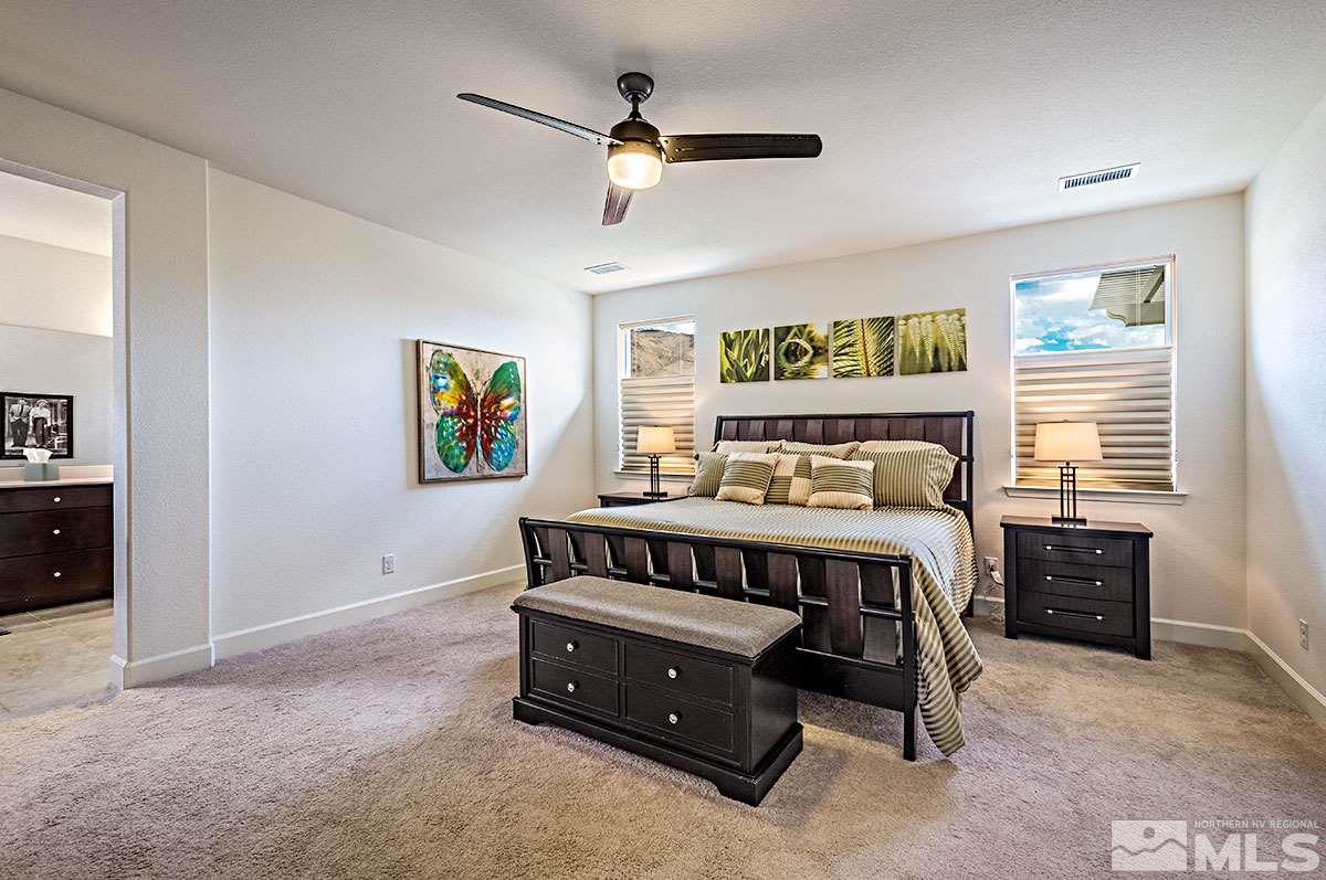 3020 Bull Rider Drive Reno, NV 89521 - Photo 13 of 25 a bedroom with a bed and a table