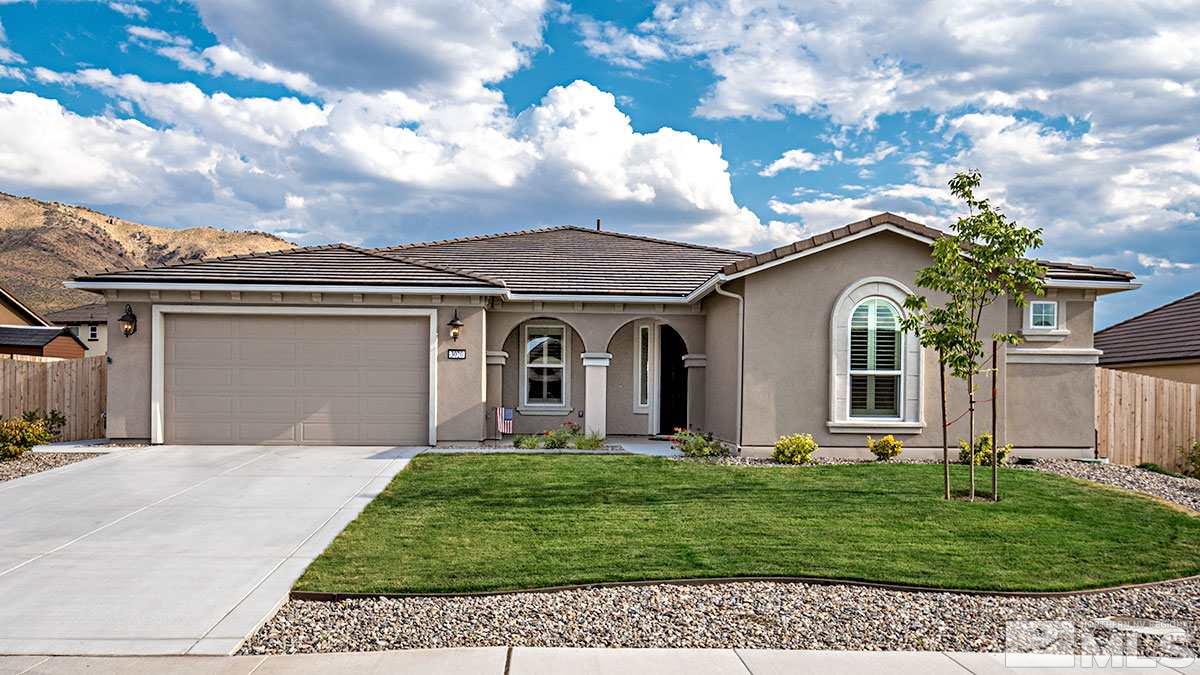 3020 Bull Rider Drive Reno, NV 89521 - Photo 2 of 25 a front view of a house with a garden and plants