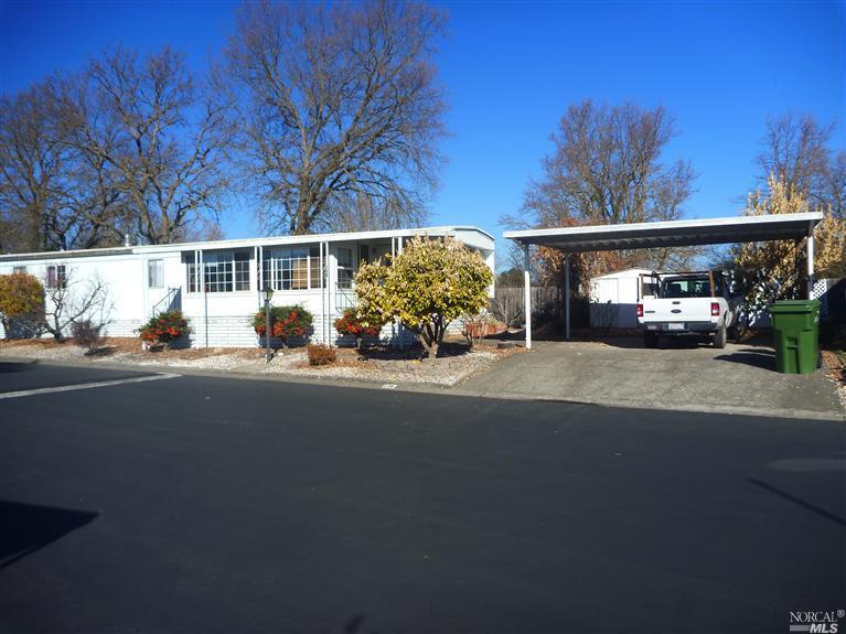 116 Shamrock Circle, Unit 116 Santa Rosa, CA 95403 - Photo 1 of 1 Front of home showing side by side parking.