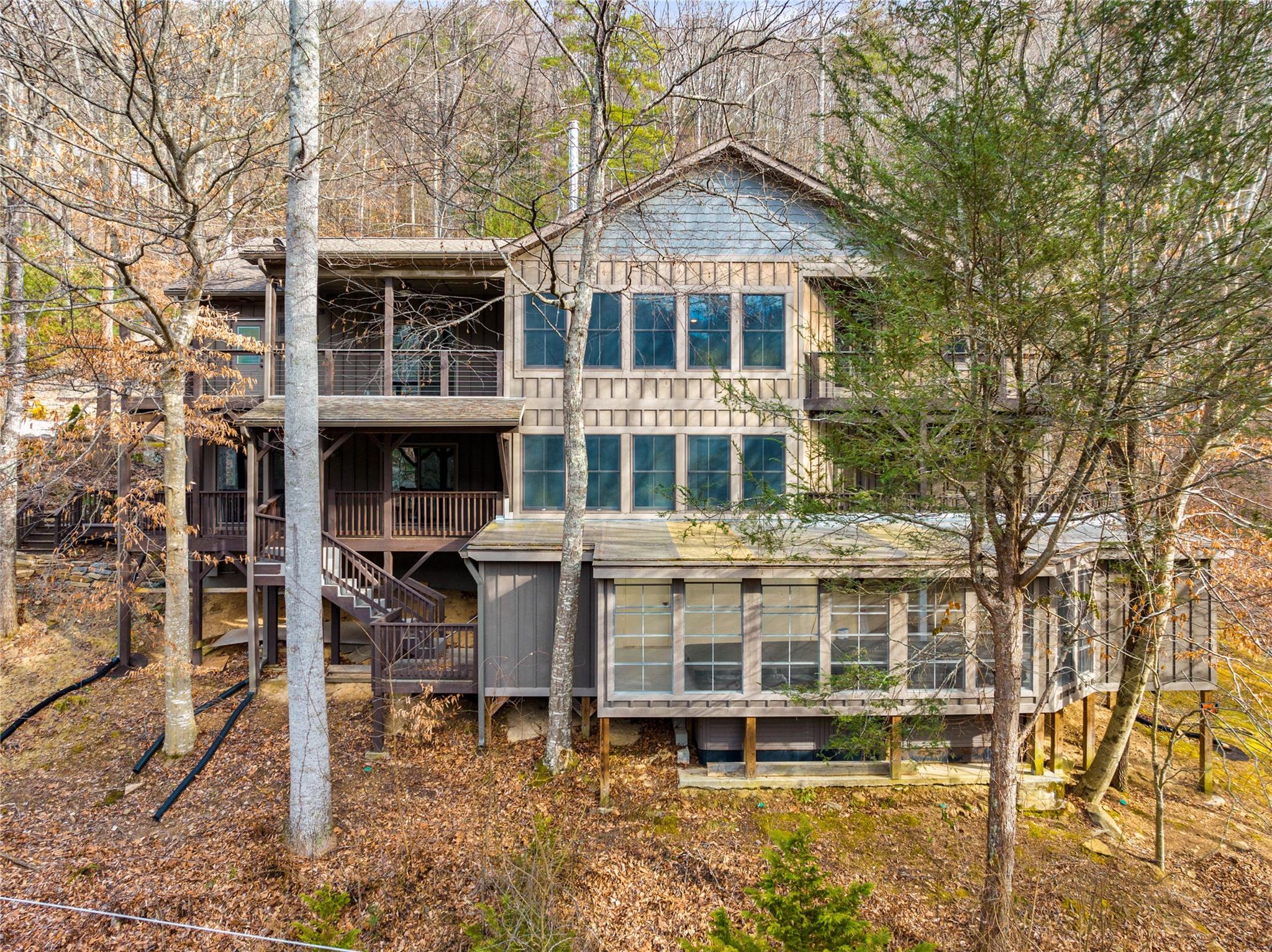23 Ruffed Grouse Drive Weaverville, NC 28787 - Photo 1 of 48 a view of a house with a yard and sitting area