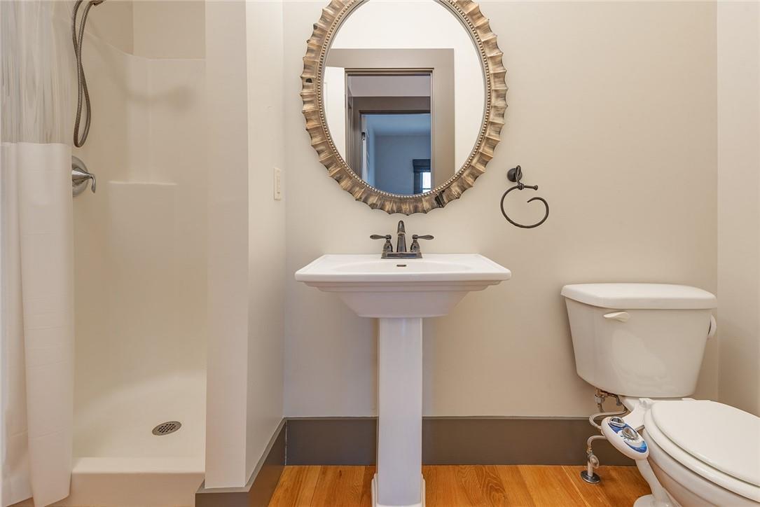 23 Ruffed Grouse Drive Weaverville, NC 28787 - Photo 16 of 48 a bathroom with a sink toilet and a mirror