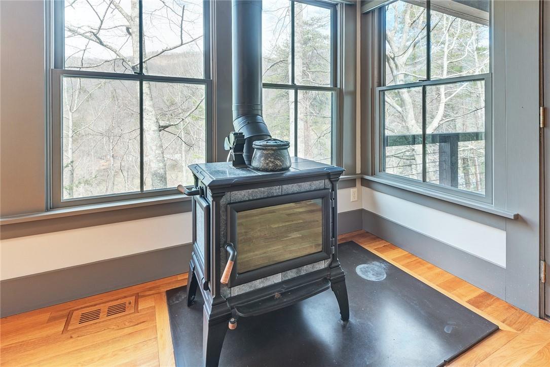 23 Ruffed Grouse Drive Weaverville, NC 28787 - Photo 20 of 48 a living room with a table chair and a window