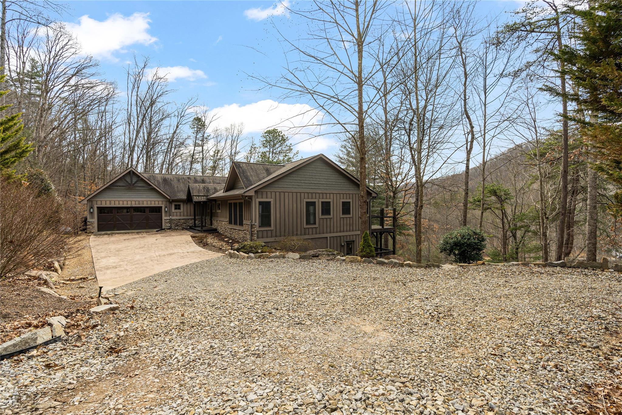 23 Ruffed Grouse Drive Weaverville, NC 28787 - Photo 2 of 48 a house with trees in the background