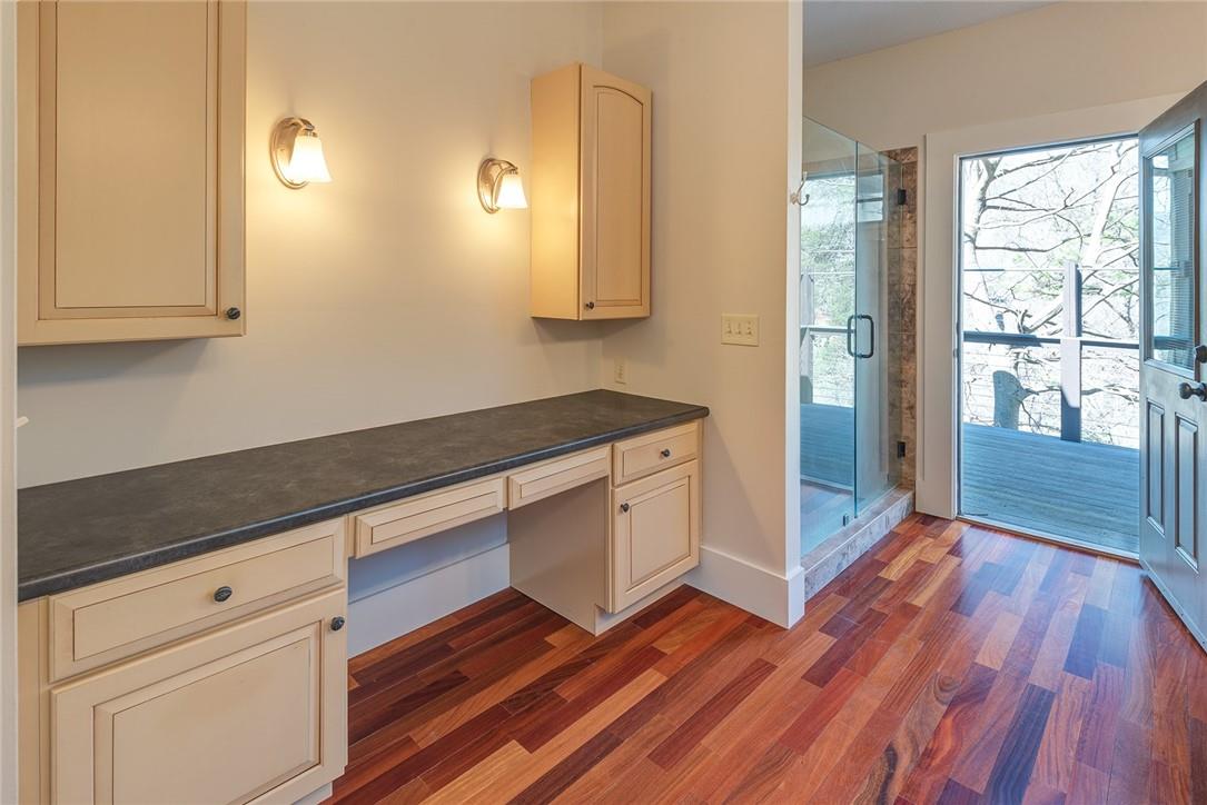 23 Ruffed Grouse Drive Weaverville, NC 28787 - Photo 24 of 48 a kitchen with granite countertop wooden floors and wide window