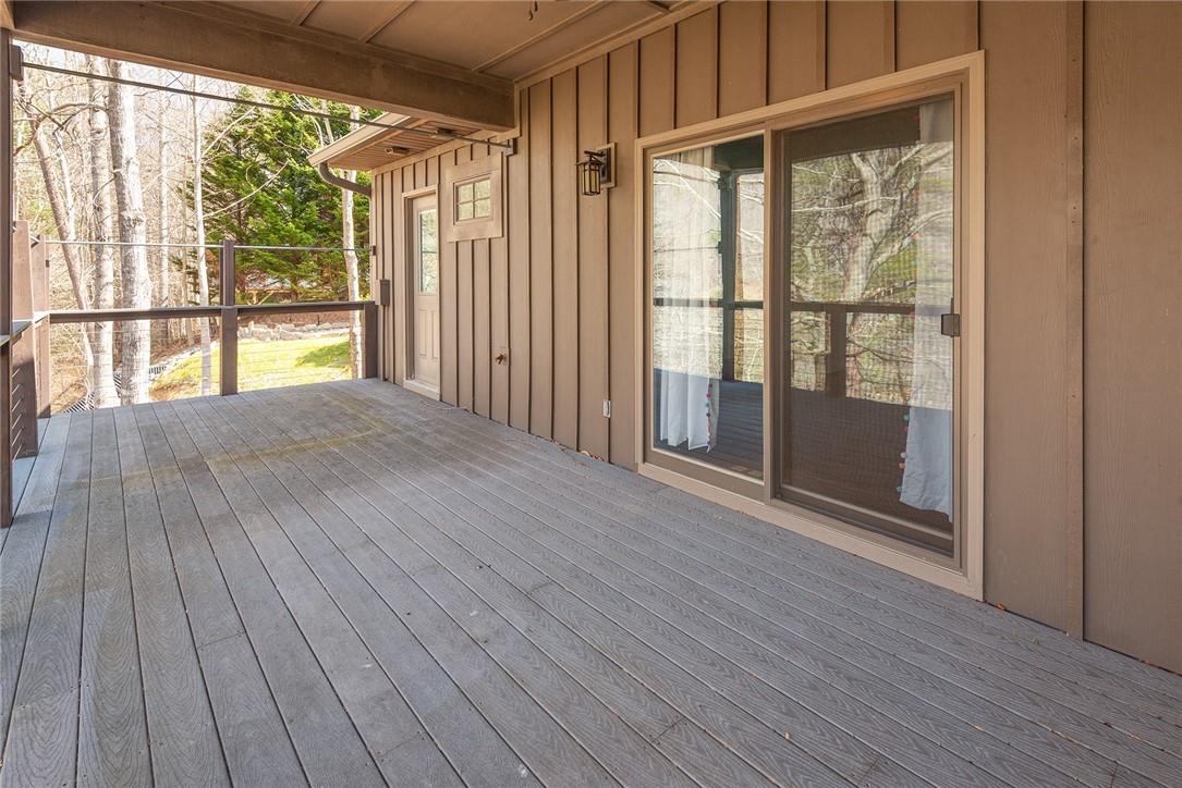 23 Ruffed Grouse Drive Weaverville, NC 28787 - Photo 27 of 48 a view of wooden floor and brick walls