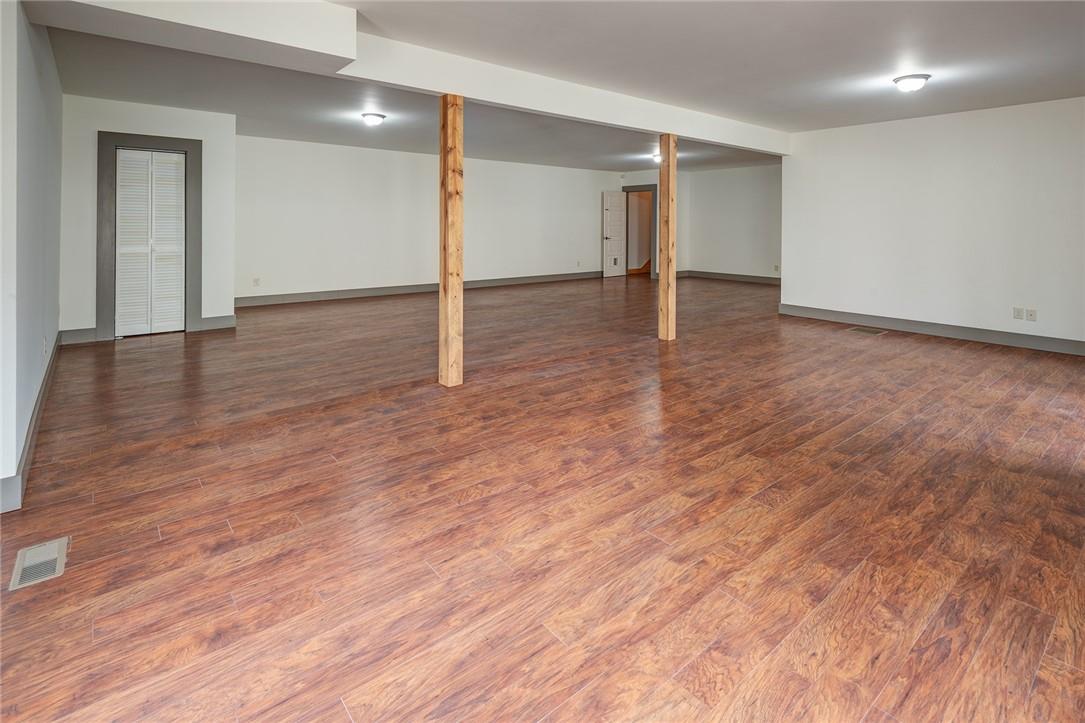 23 Ruffed Grouse Drive Weaverville, NC 28787 - Photo 31 of 48 a view of an empty room with wooden floor