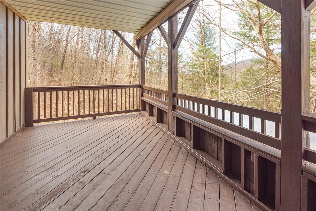 23 Ruffed Grouse Drive Weaverville, NC 28787 - Photo 38 of 48 a view of a balcony with wooden floor