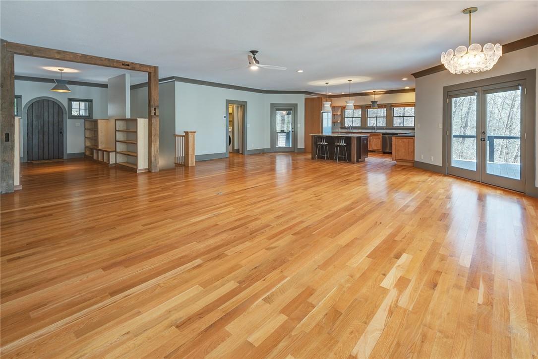 23 Ruffed Grouse Drive Weaverville, NC 28787 - Photo 4 of 48 a view of a room with wooden floor and windows