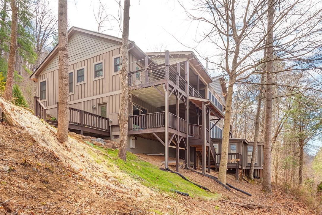 23 Ruffed Grouse Drive Weaverville, NC 28787 - Photo 41 of 48 a view of a large white house with a large tree