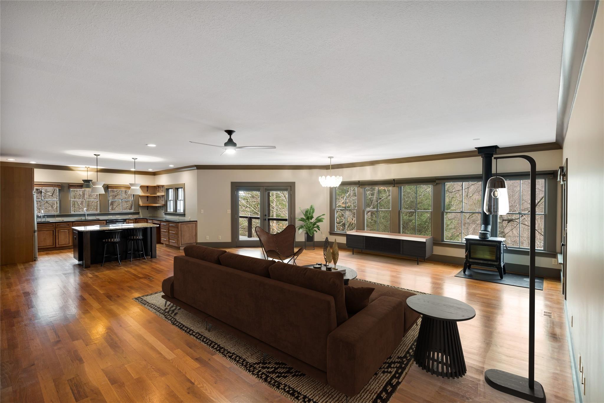 23 Ruffed Grouse Drive Weaverville, NC 28787 - Photo 5 of 48 a living room with furniture and a wooden floor