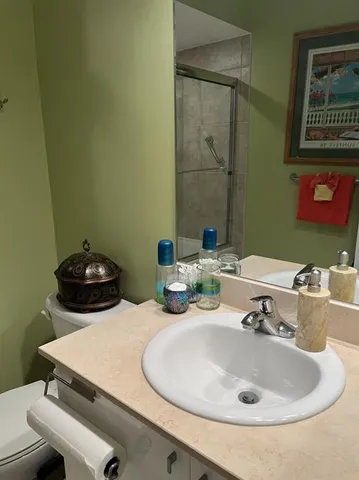 a bathroom with a white bath tub and a shower